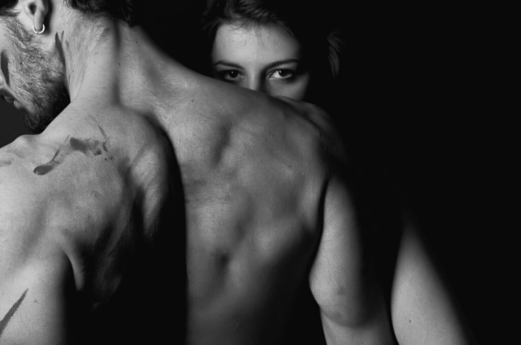 slow burn romance worth every page b&w image of couple, back of man, front of woman